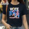 Stream Vote Trump 2024 Fist Pump Never Surrender Fighter T Shirt 2 Shirt